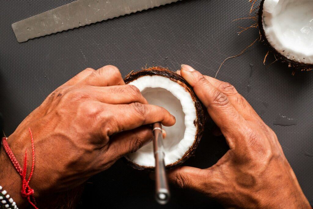 person holding stainless steel knife